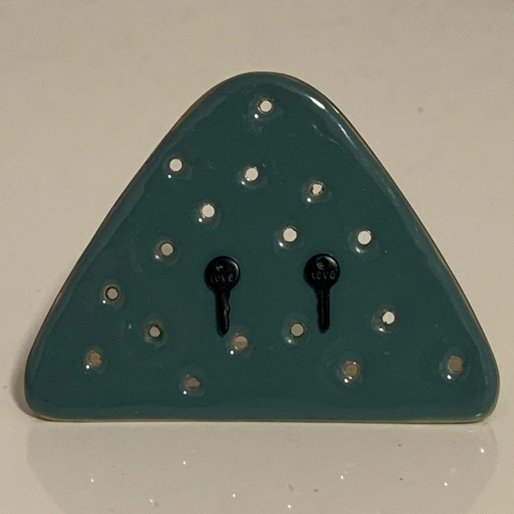 The Giving Keys Matte Black “Love” Mini Key Post Earrings.